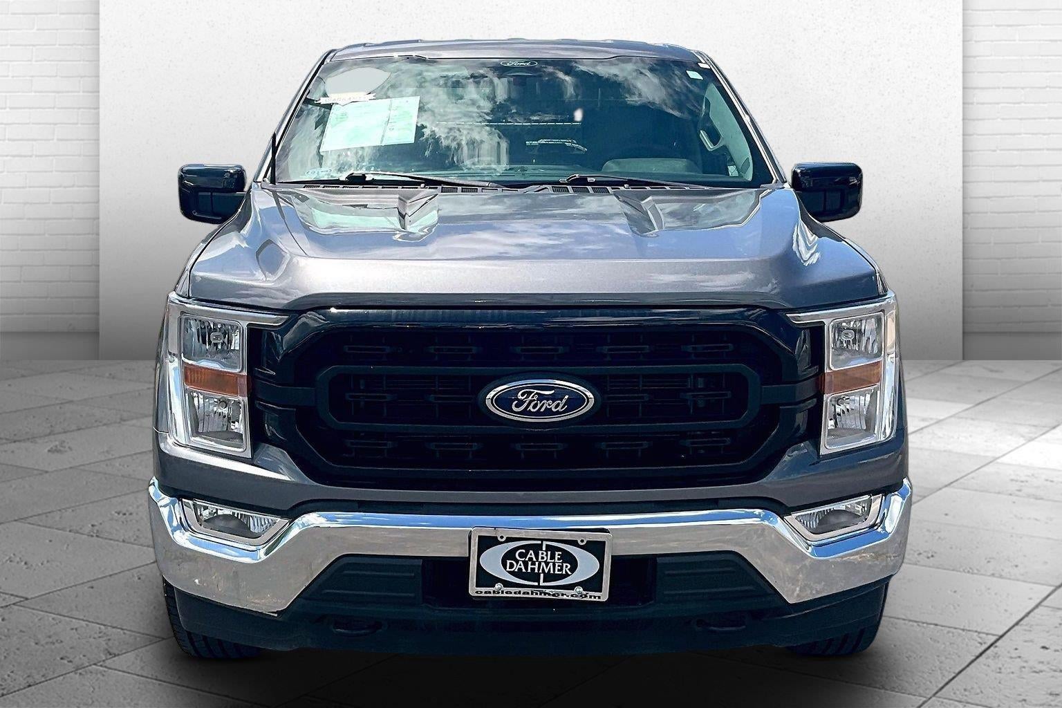 Used 2022 Ford F-150 XLT with VIN 1FTFW1E87NKF04411 for sale in Kansas City