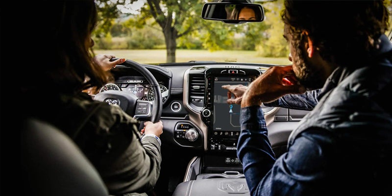 Pre-owned Ram 2500 interior showing premium cabin and technology